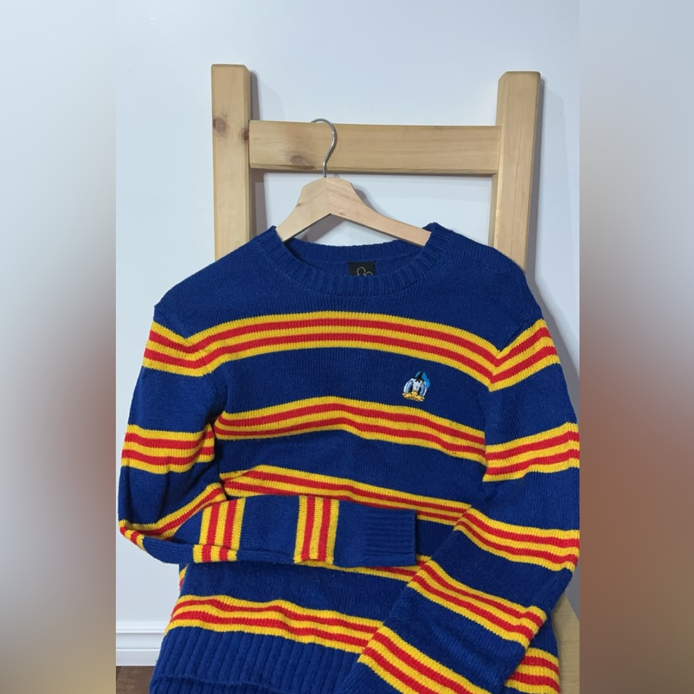 Pullover knit sweater, disney collection. Donald duck embroidered. Stripped.